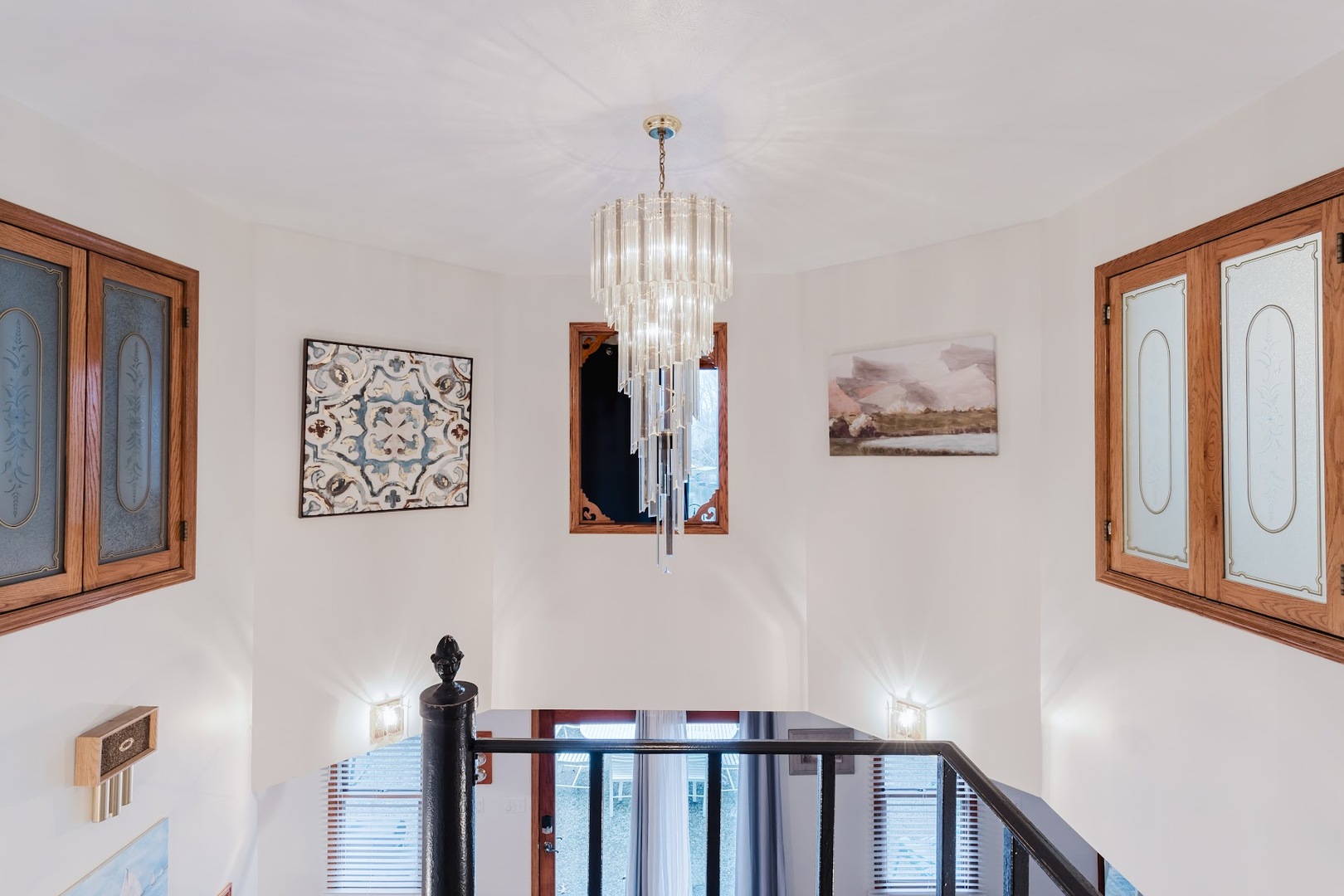 175 Oak Circle Goreville, IL 62939 - Photo 36 of 60 a view of hallway with window and a chandelier