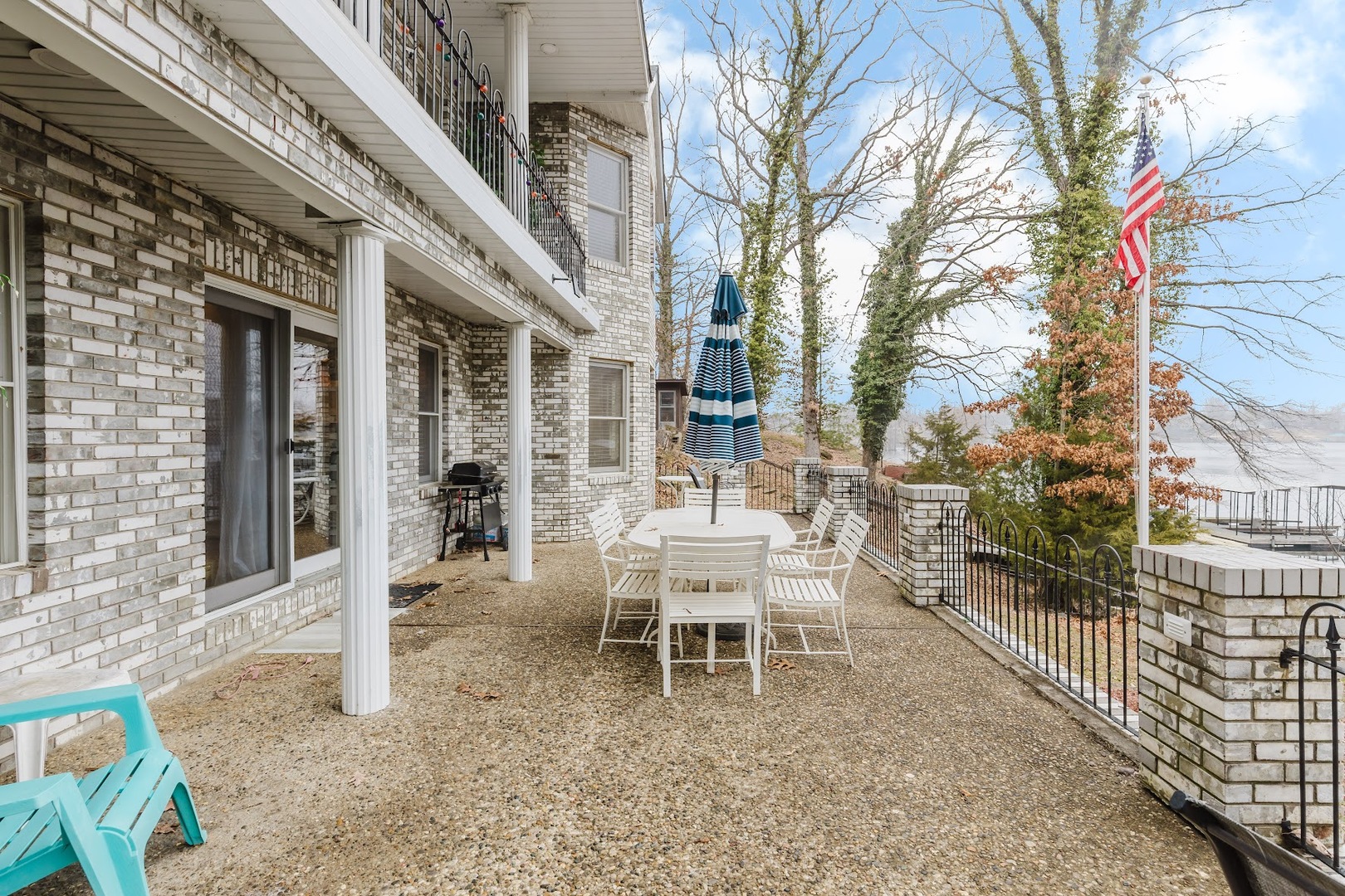175 Oak Circle Goreville, IL 62939 - Photo 49 of 60 a chair and table in front of a building
