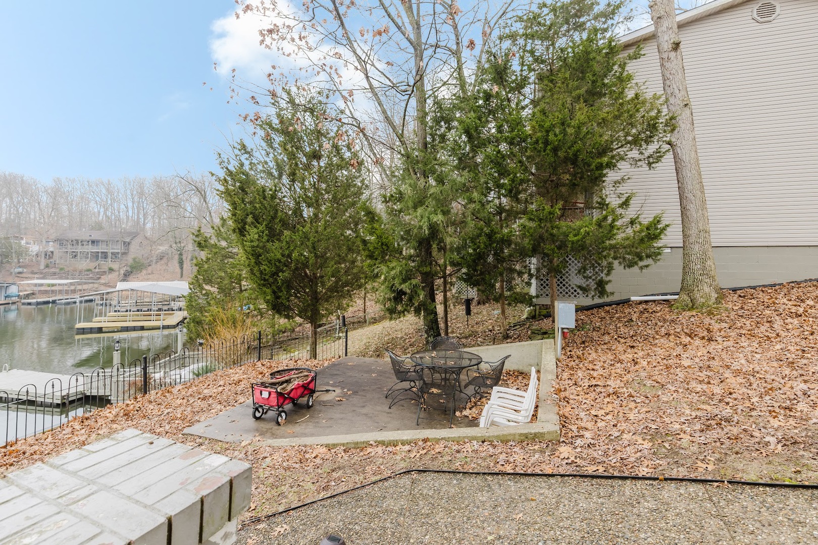 175 Oak Circle Goreville, IL 62939 - Photo 51 of 60 a view of a patio with table and chairs and potted plants