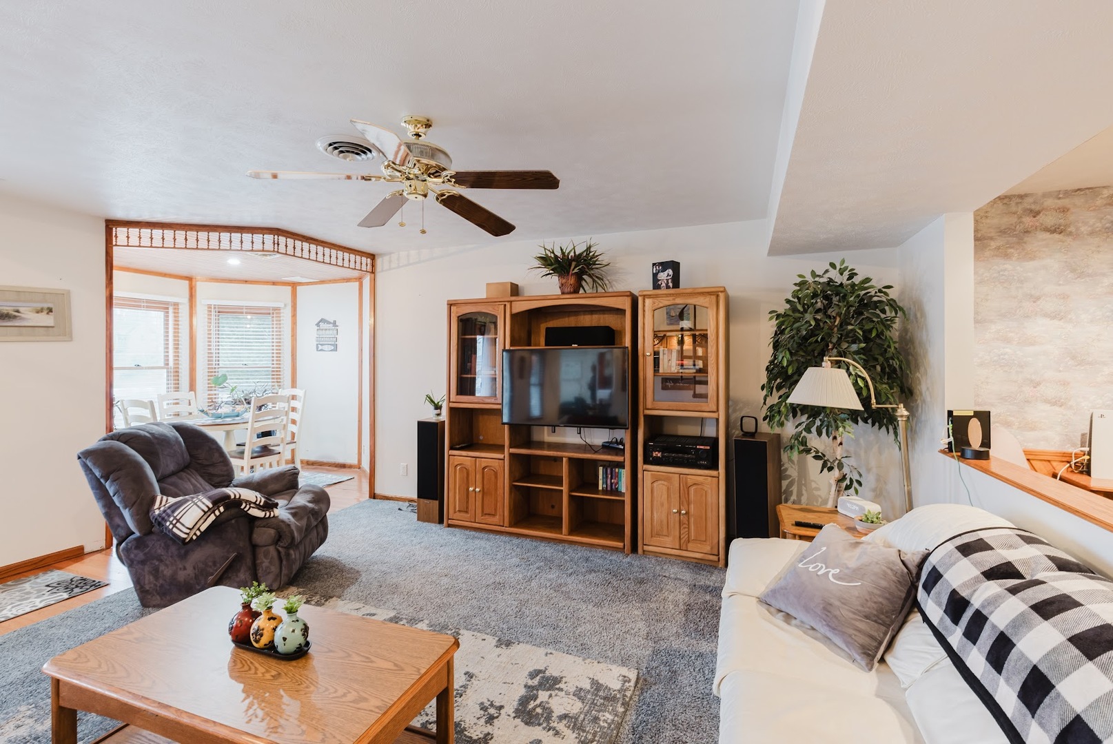 175 Oak Circle Goreville, IL 62939 - Photo 8 of 60 a living room with furniture a chandelier and a flat screen tv