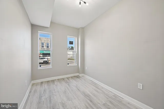 an empty room with windows