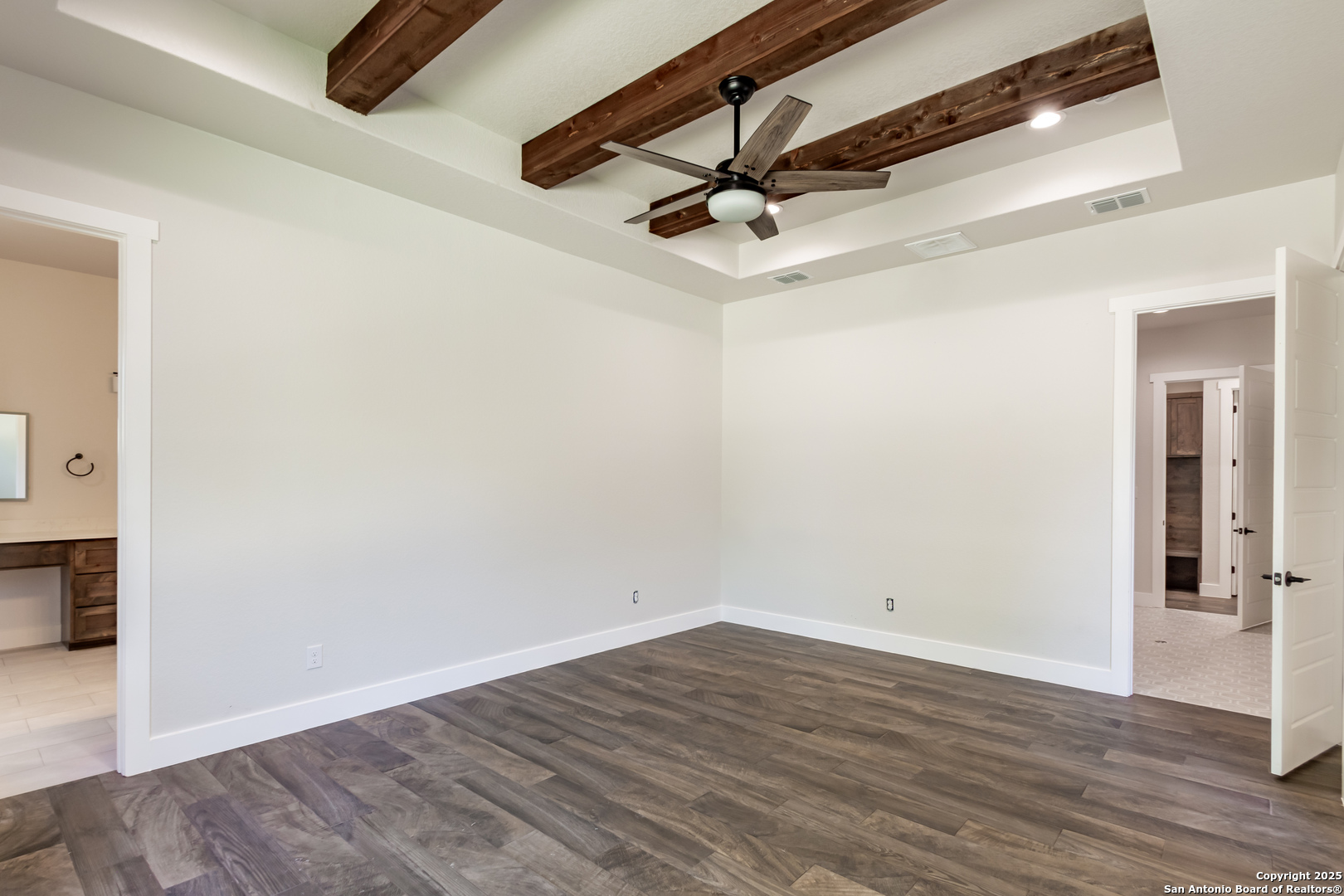 246 Timber Place La Vernia, TX 78121 - Photo 14 of 33 a view of a room with wooden floor