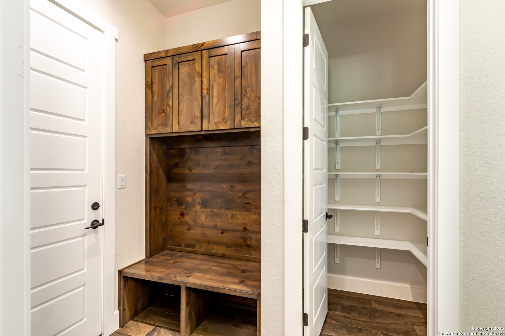 246 Timber Place La Vernia, TX 78121 - Photo 27 of 33 a view of walk in closet with empty racks