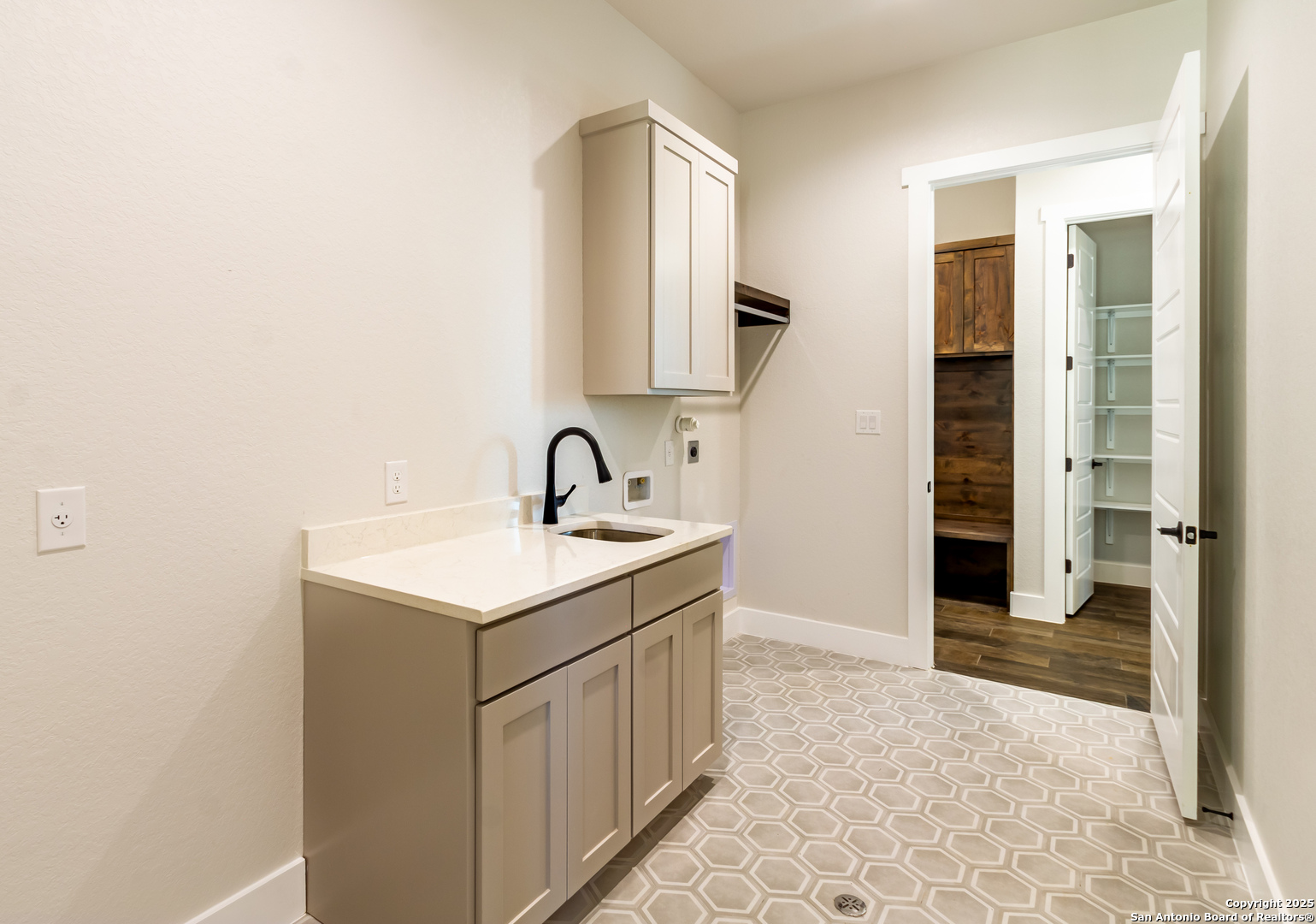 246 Timber Place La Vernia, TX 78121 - Photo 28 of 33 a bathroom with a sink and a mirror