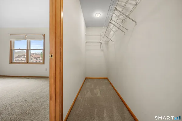 a view of hallway with a large window