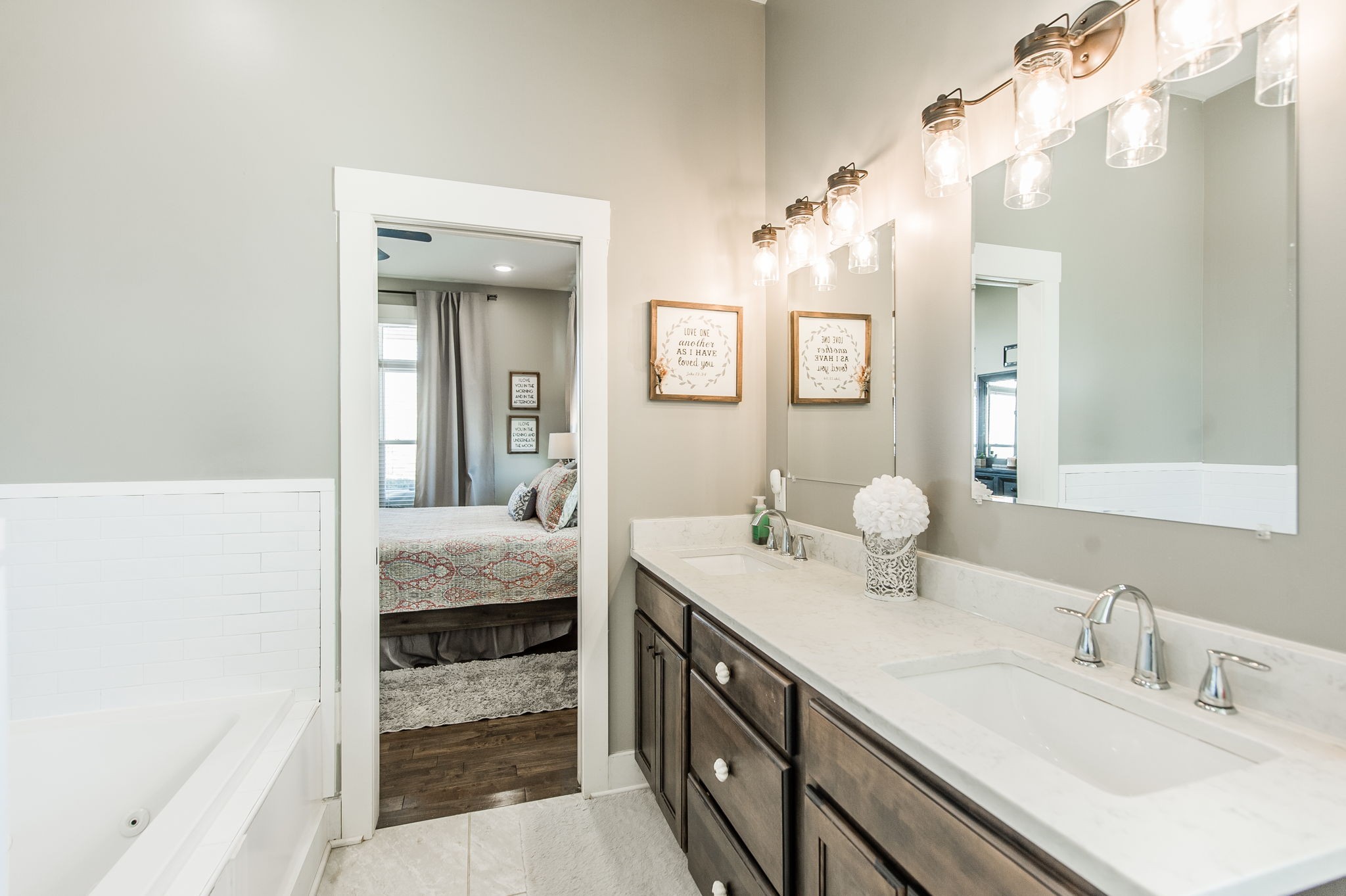 449 Fowler Ford Road Portland, TN 37148 - Photo 27 of 46 a en suite bathroom with a double vanity sink and a mirror