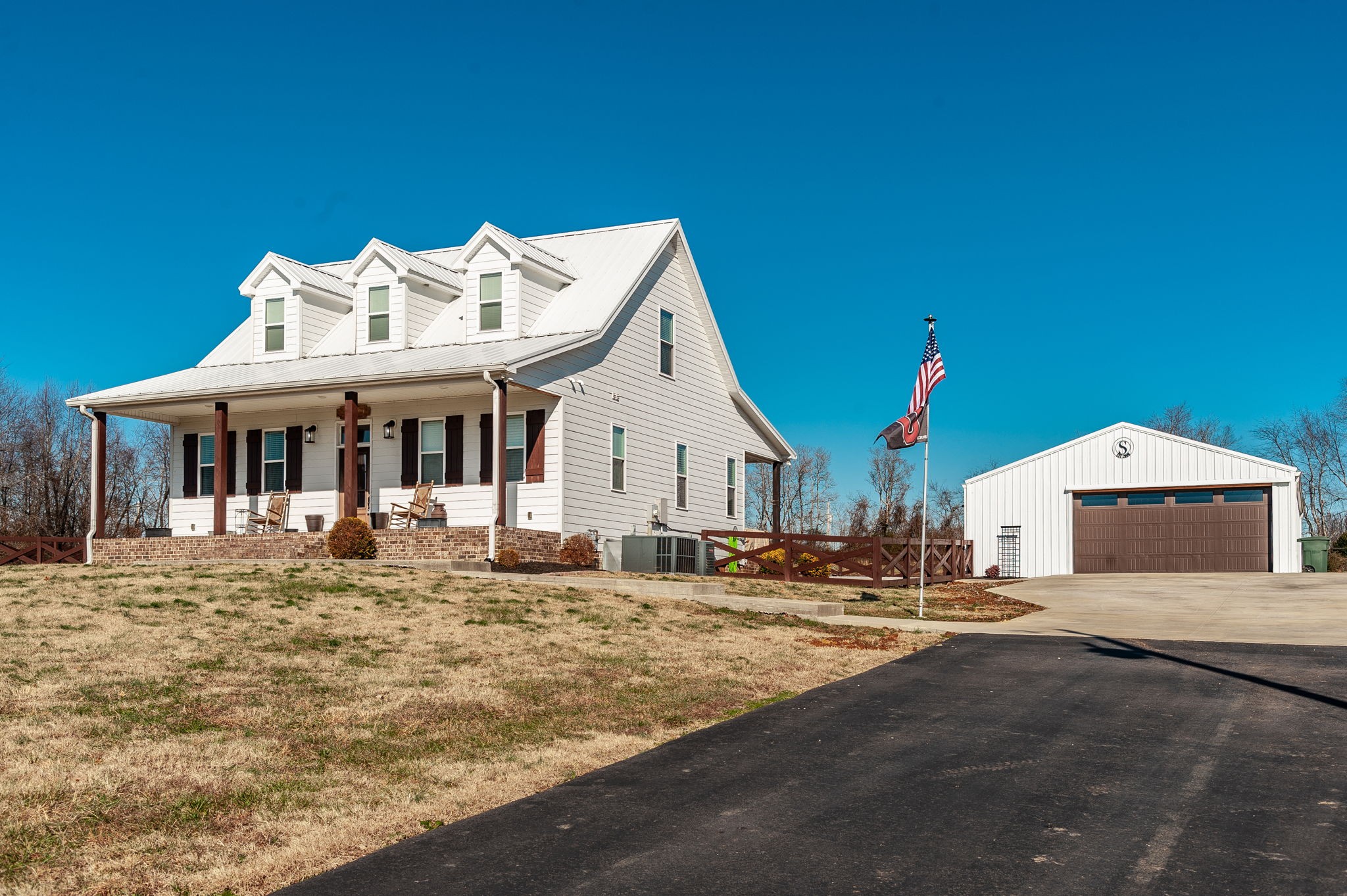 449 Fowler Ford Road Portland, TN 37148 - Photo 3 of 46 a front view of a house with garden