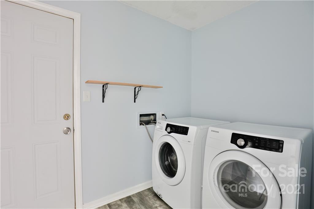 7825 Davis Road Mint Hill, NC 28227 - Photo 13 of 16 a utility room with dryer and washer