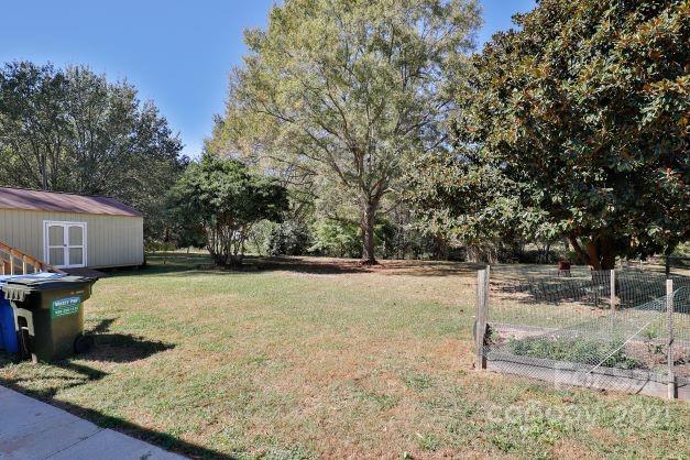 7825 Davis Road Mint Hill, NC 28227 - Photo 16 of 16 a backyard of a house with barbeque oven
