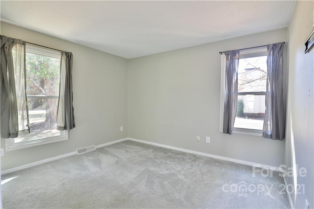 7825 Davis Road Mint Hill, NC 28227 - Photo 9 of 16 an empty room with a window