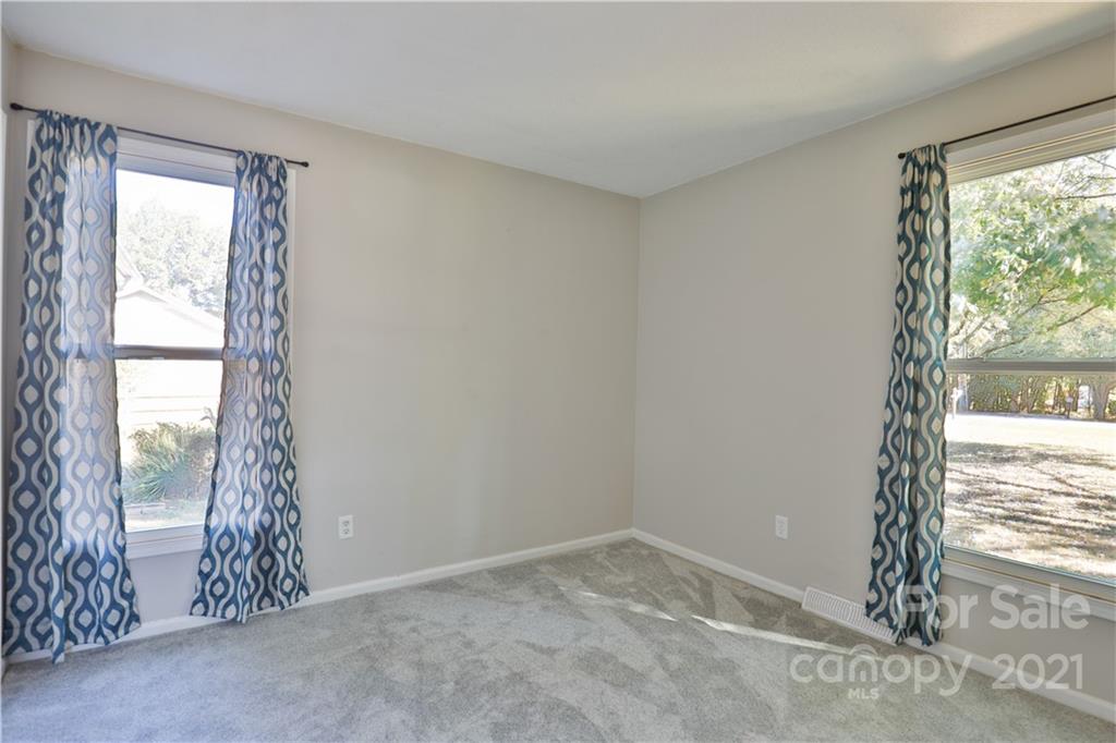 7825 Davis Road Mint Hill, NC 28227 - Photo 10 of 16 a view of an empty room and window