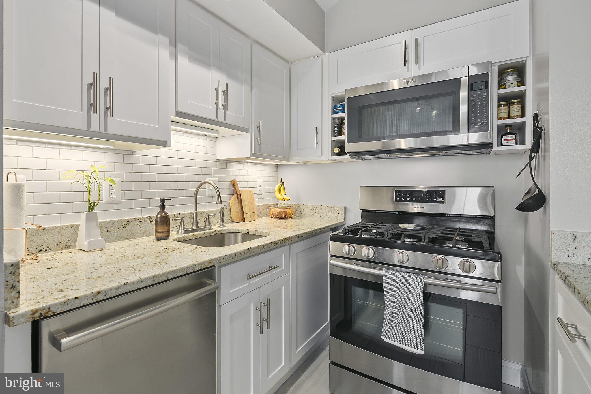 2707 Adams Mill Road Northwest, Unit 404 Washington, DC 20009 - Photo 18 of 54 Kitchen with stainless steel appliances