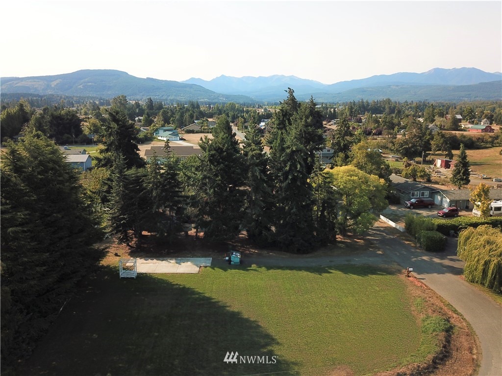 281 Wright Road Sequim, WA 98382 - Photo 2 of 25 a view of a lake in middle of the town