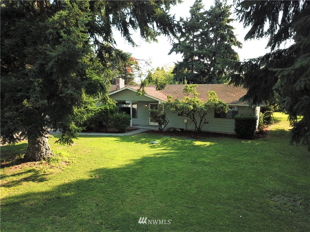 281 Wright Road Sequim, WA 98382 - Photo 22 of 25 a view of a house with a yard