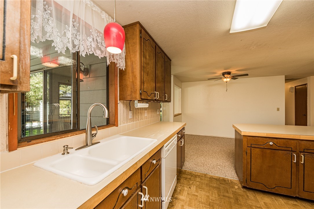 281 Wright Road Sequim, WA 98382 - Photo 6 of 25 a bathroom with a sink vanity and a mirror