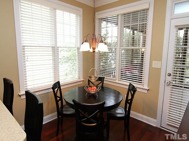 2225 Karns Place Raleigh, NC 27614 - Photo 10 of 23 Breakfast area over looks your spacious screened in porch, hardwood floors, bar overlooking your kitchen, makes for plenty of room for gatherings, and entertaining.