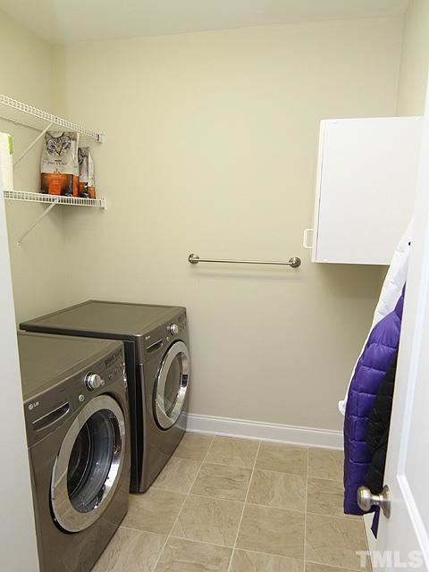 2225 Karns Place Raleigh, NC 27614 - Photo 20 of 23 This laundry room is plenty big for all your laundry needs.