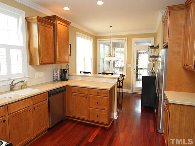 2225 Karns Place Raleigh, NC 27614 - Photo 8 of 23 Look at this spacious beautiful kitchen, ready for the chef in the family, lots of cabinet space, plenty of counter space for you to work with, hardwood floors, open to breakfast area.