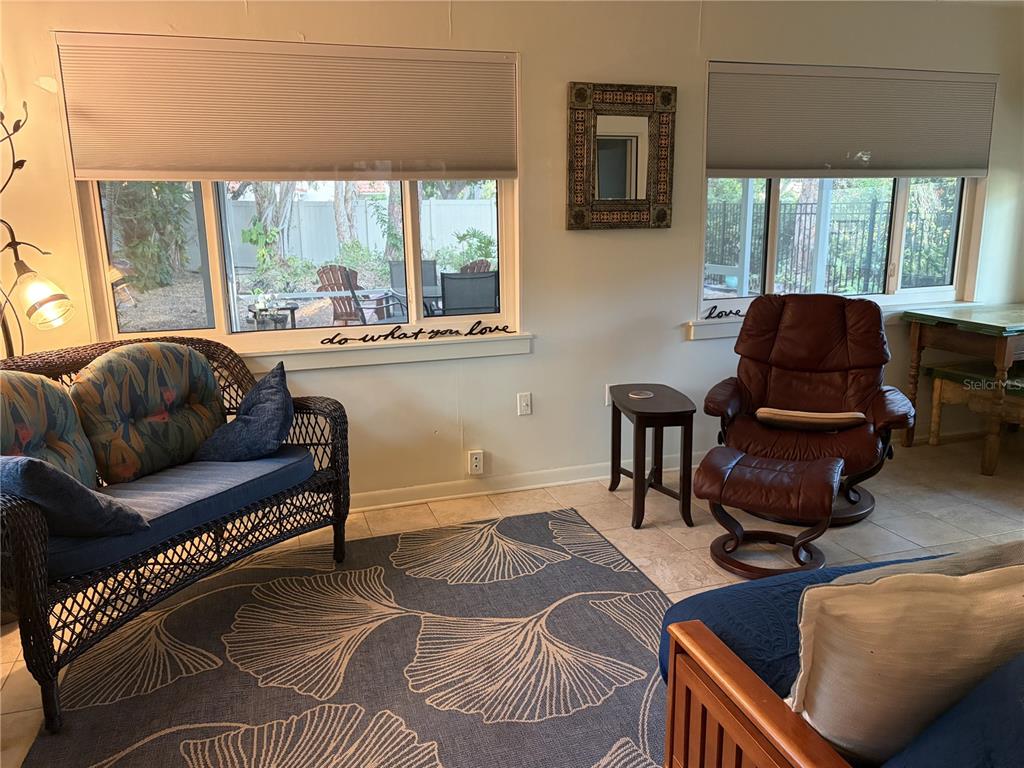 421 Riviera Street Venice, FL 34285 - Photo 16 of 30 a living room with furniture and a large window