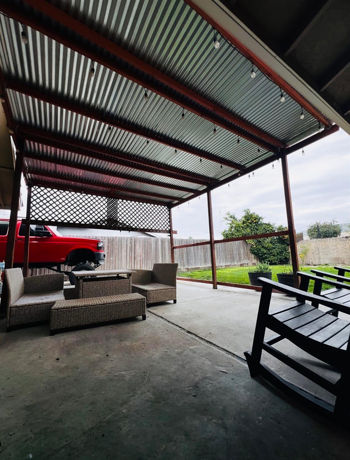 2101 Milford Lane Modesto, CA 95355 - Photo 16 of 18 a view of a swimming pool with a porch