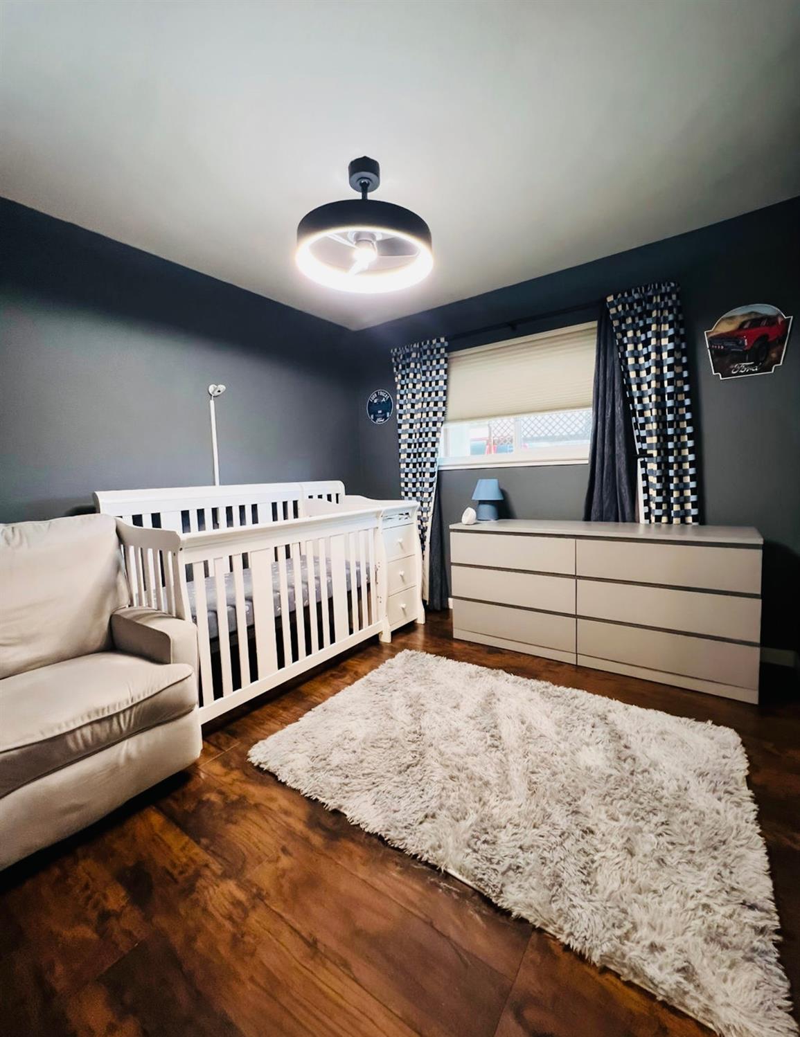 2101 Milford Lane Modesto, CA 95355 - Photo 7 of 18 a view of a livingroom with furniture and staircase