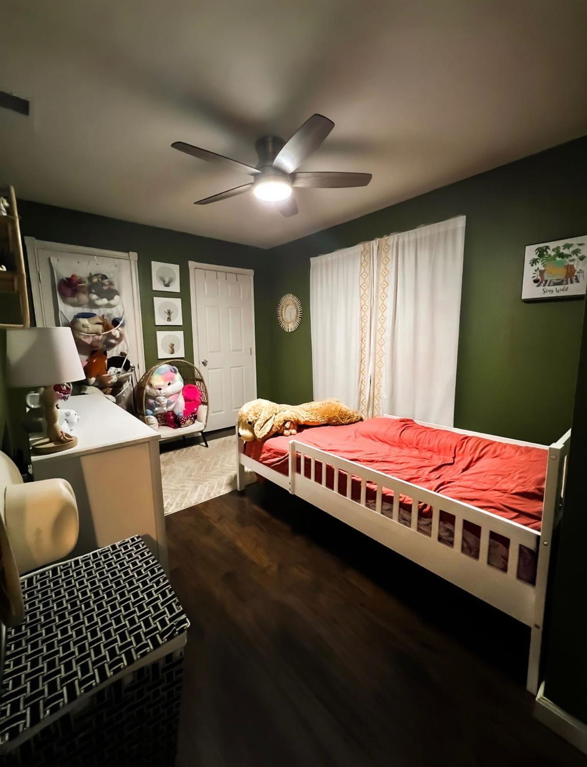 2101 Milford Lane Modesto, CA 95355 - Photo 8 of 18 a bed room with a bed and a couch