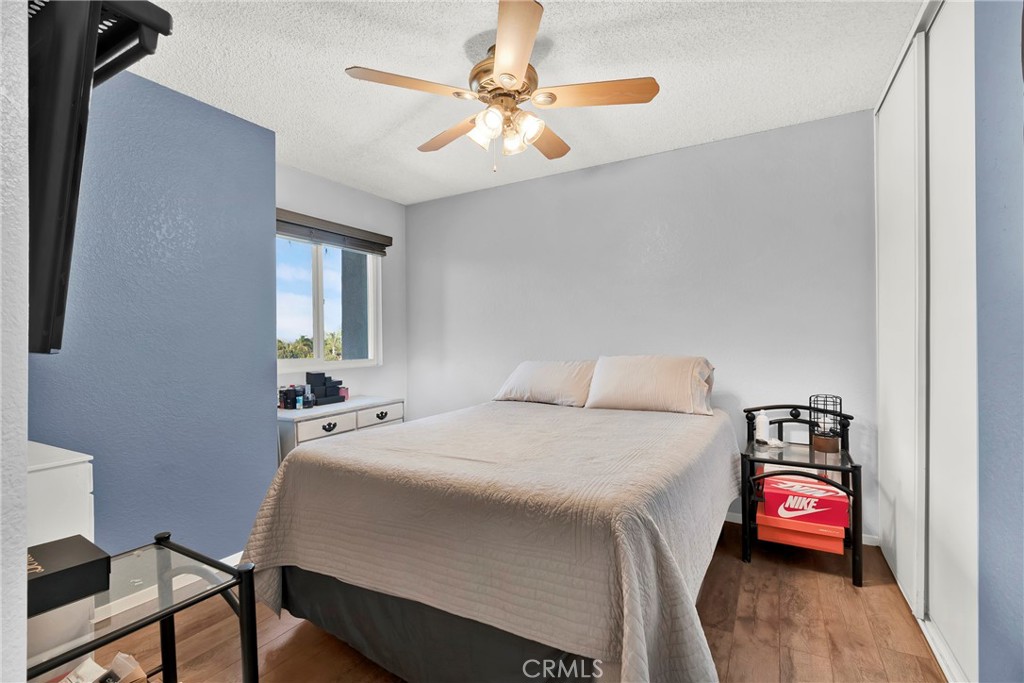 3350 May Court Riverside, CA 92503 - Photo 14 of 55 a bedroom with a bed and a chandelier