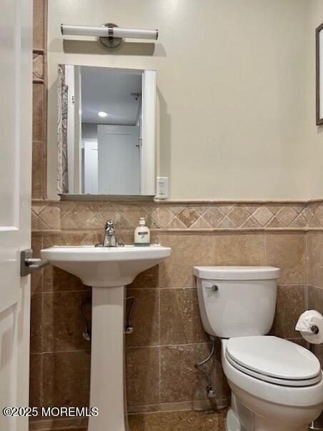 892 Elberon Avenue, Unit STUDIO Elberon, NJ 07740 - Photo 15 of 24 a bathroom with a sink mirror vanity and toilet