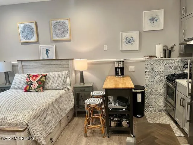 a bed room with a bed and furniture