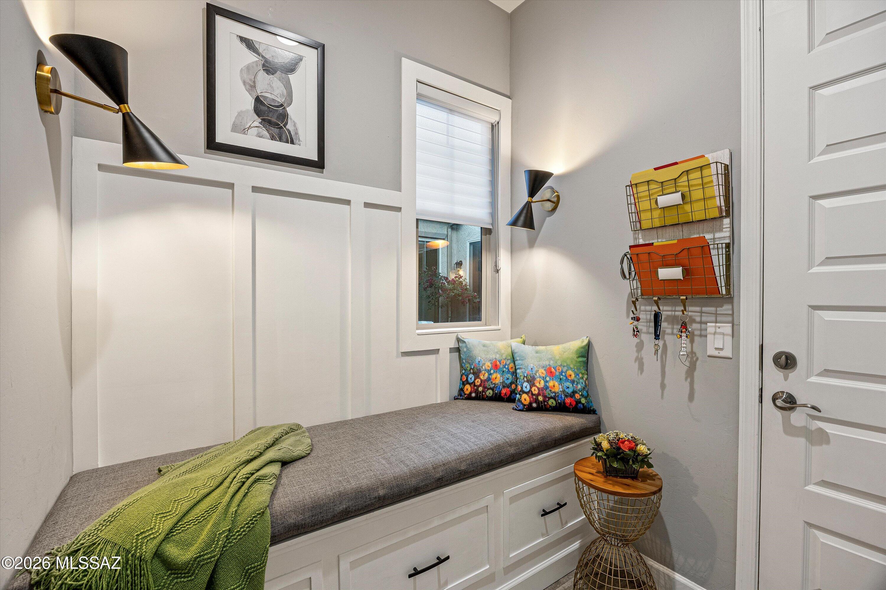 8489 North Lone Ranger Road Tucson, AZ 85743 - Photo 39 of 50 Gorgeous mud room with storage bench and ambiance lighting.