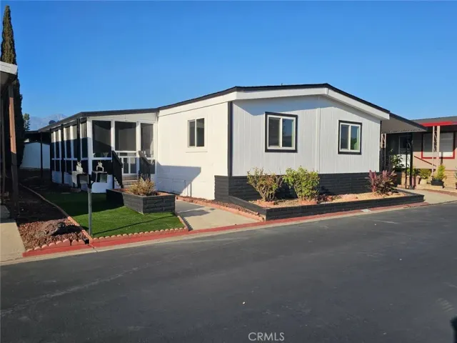 a house view with a garden space