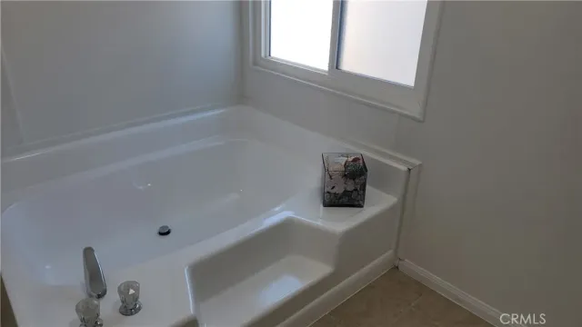 a bathroom with a bathtub