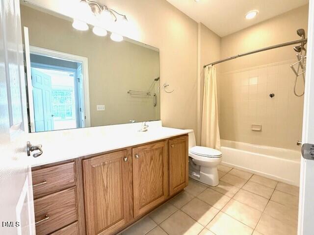4713 Ivy Crest Court Raleigh, NC 27604 - Photo 16 of 46 a bathroom with a sink a toilet and shower