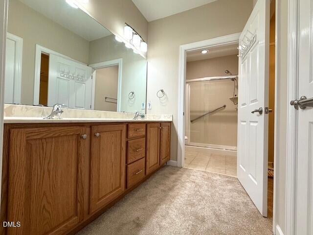 4713 Ivy Crest Court Raleigh, NC 27604 - Photo 21 of 46 a spacious bathroom with a tub sink mirror and shower