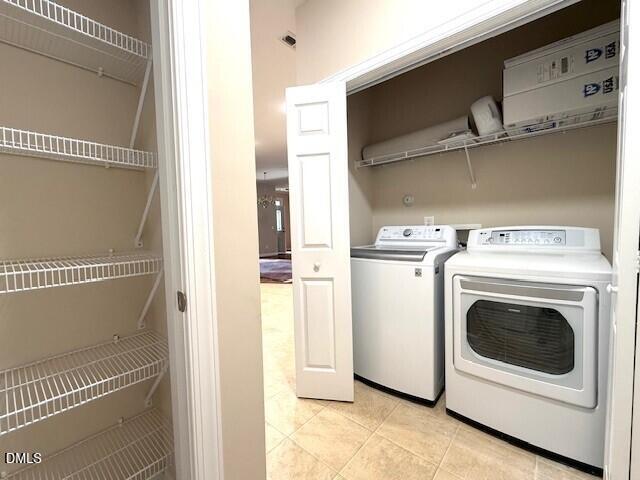 4713 Ivy Crest Court Raleigh, NC 27604 - Photo 32 of 46 a utility room with dryer and washer