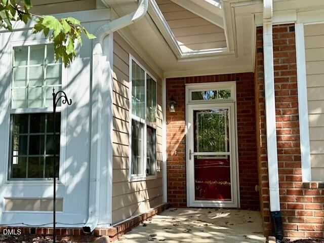 4713 Ivy Crest Court Raleigh, NC 27604 - Photo 40 of 46 a view of a entryway door front of house