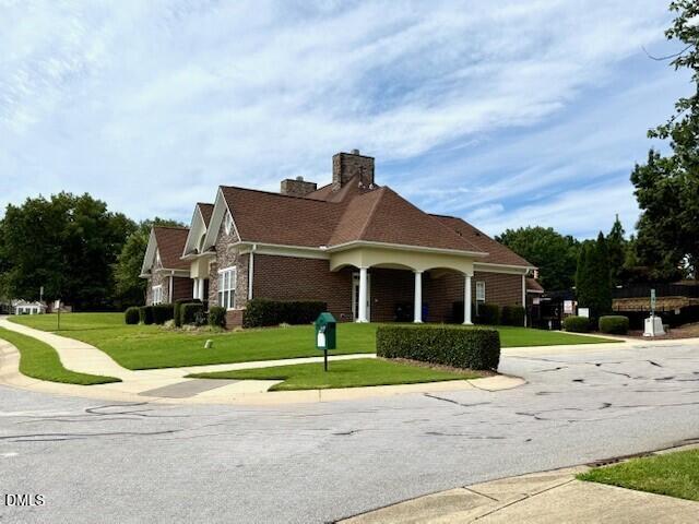 4713 Ivy Crest Court Raleigh, NC 27604 - Photo 41 of 46 a front view of a house with a yard