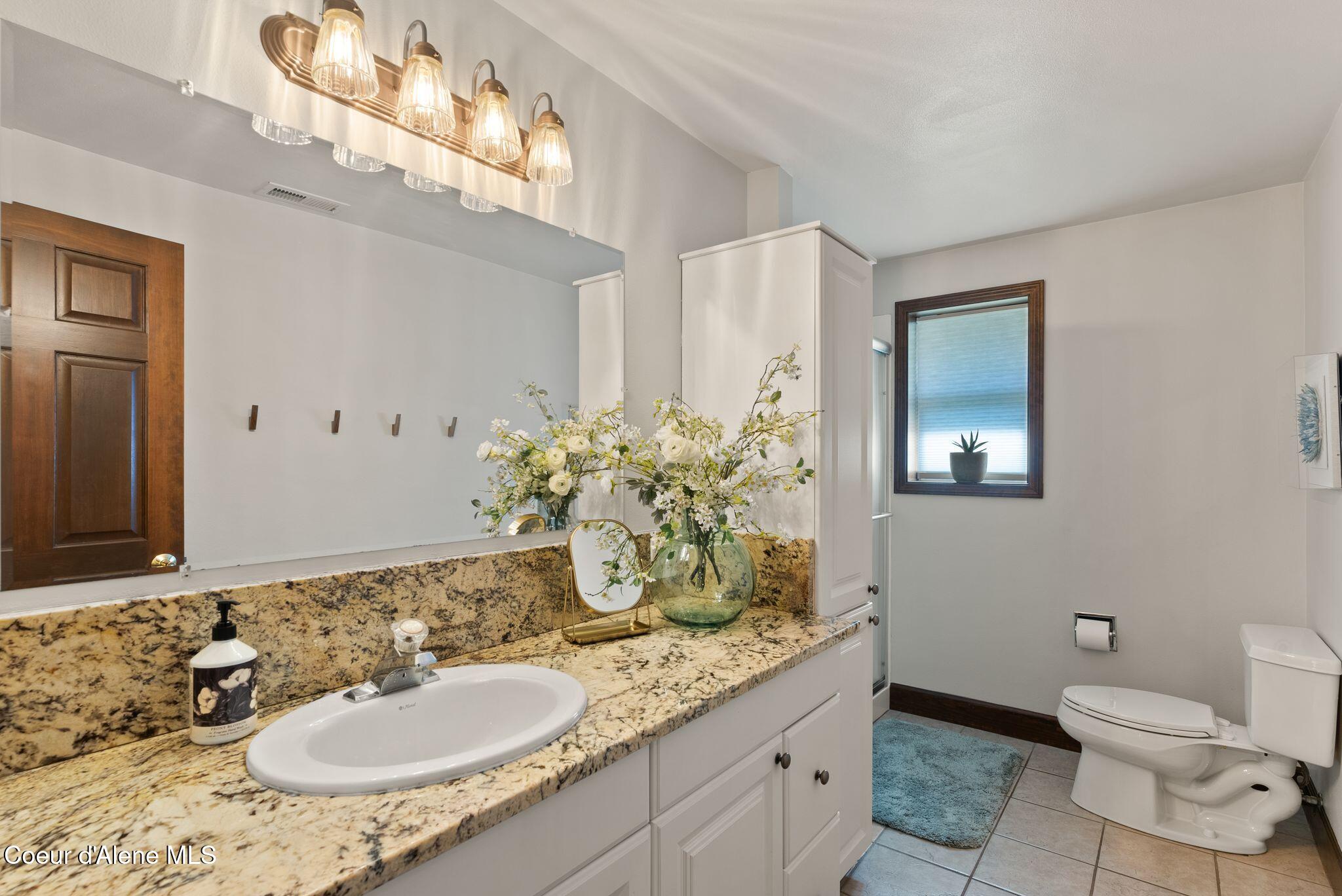 1926 Rodkey Drive Post Falls, ID 83854 - Photo 25 of 66 Light and Bright Bathroom