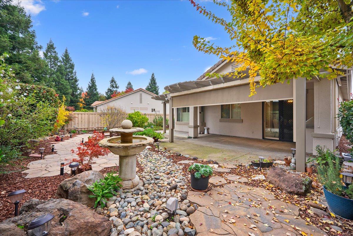 286 Lariat Loop Lincoln, CA 95648 - Photo 23 of 37 a view of a backyard with sitting area