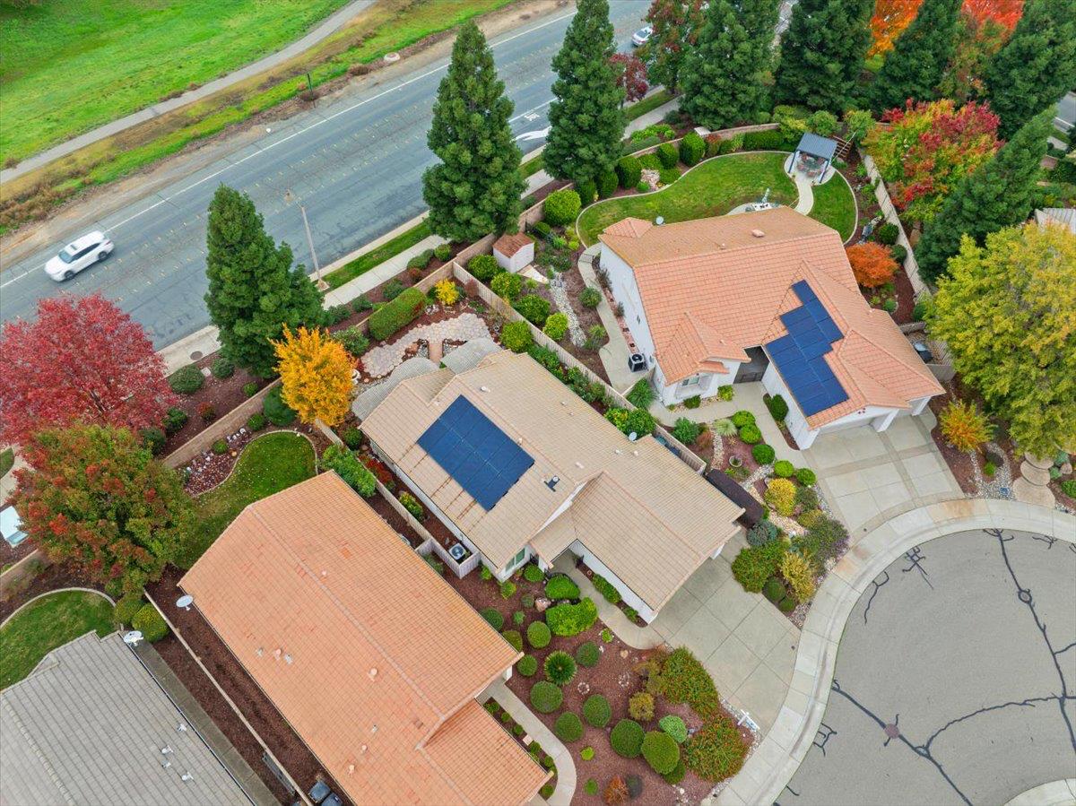 286 Lariat Loop Lincoln, CA 95648 - Photo 26 of 37 an aerial view of a house with a yard and pool