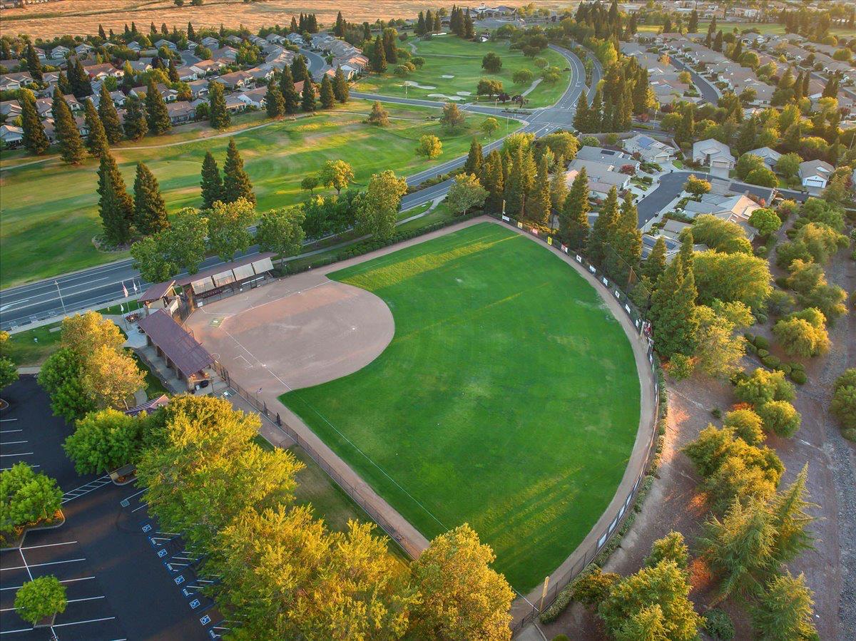 286 Lariat Loop Lincoln, CA 95648 - Photo 34 of 37 an aerial view of a golf course with parking space