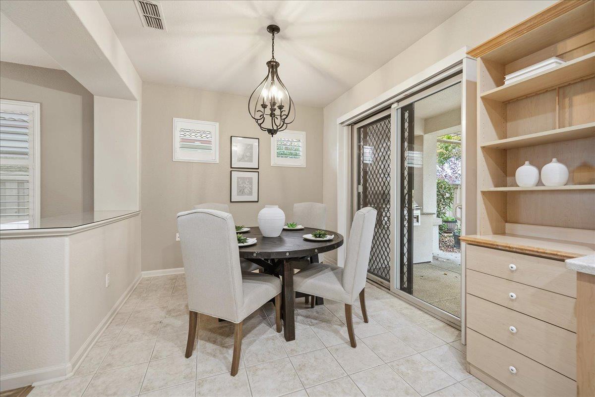 286 Lariat Loop Lincoln, CA 95648 - Photo 9 of 37 a view of a dining room with furniture and chandelier