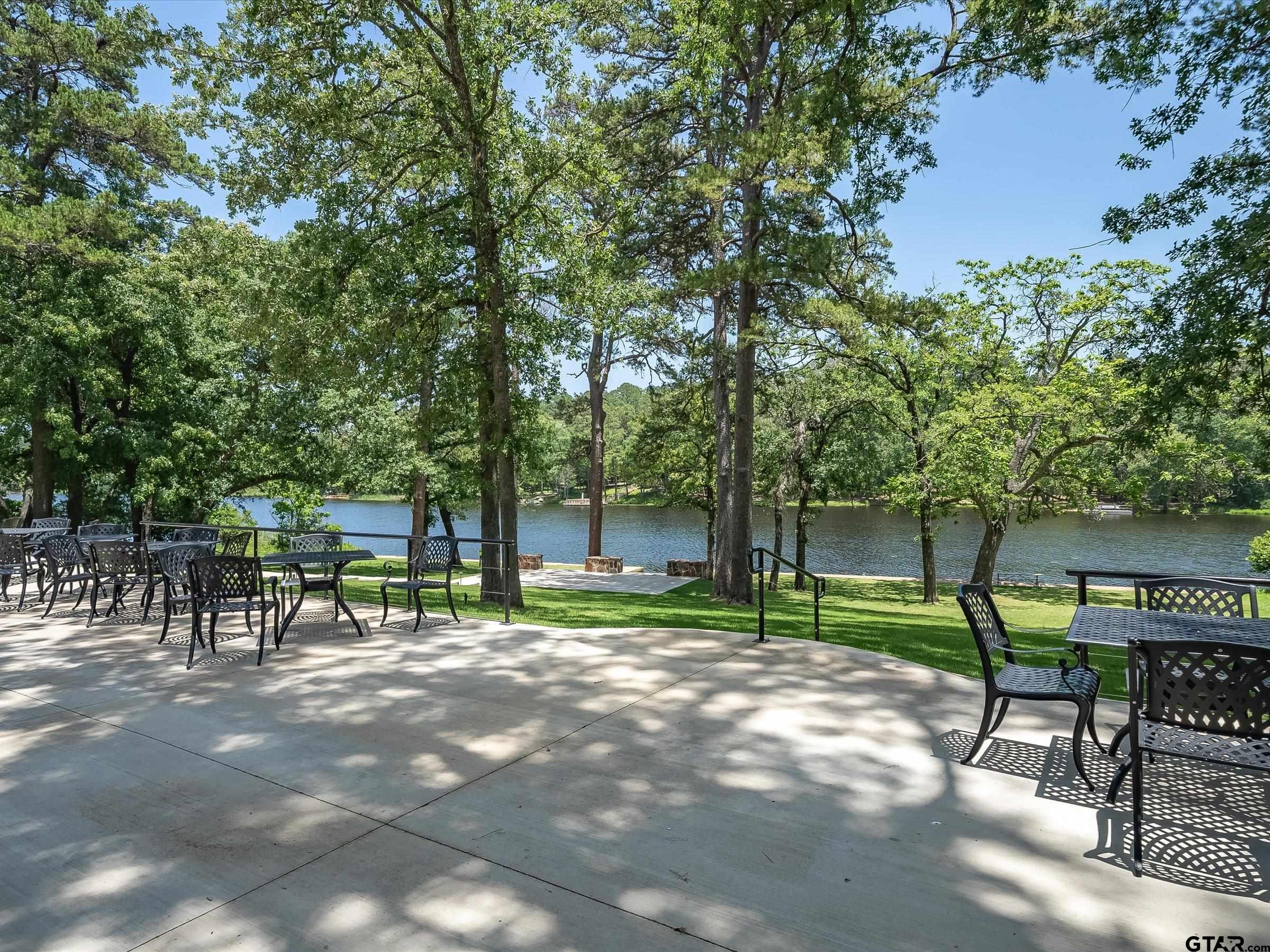 289 Llano Bend Holly Lake Ranch, TX 75765 - Photo 46 of 48 a view of lawn chairs and table in a yard
