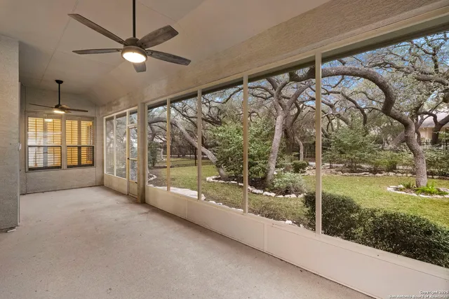 a view of a room with yard and balcony