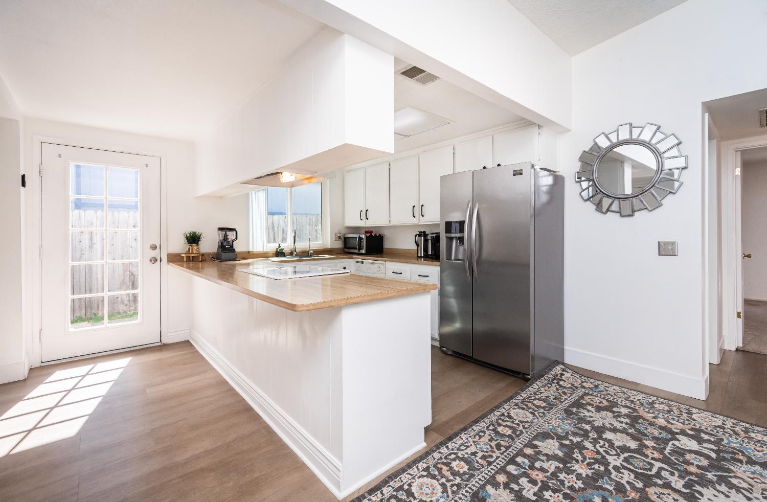 2000 Inglis Way, Unit A Roseville, CA 95678 - Photo 11 of 45 a kitchen with stainless steel appliances granite countertop a refrigerator a sink and a stove