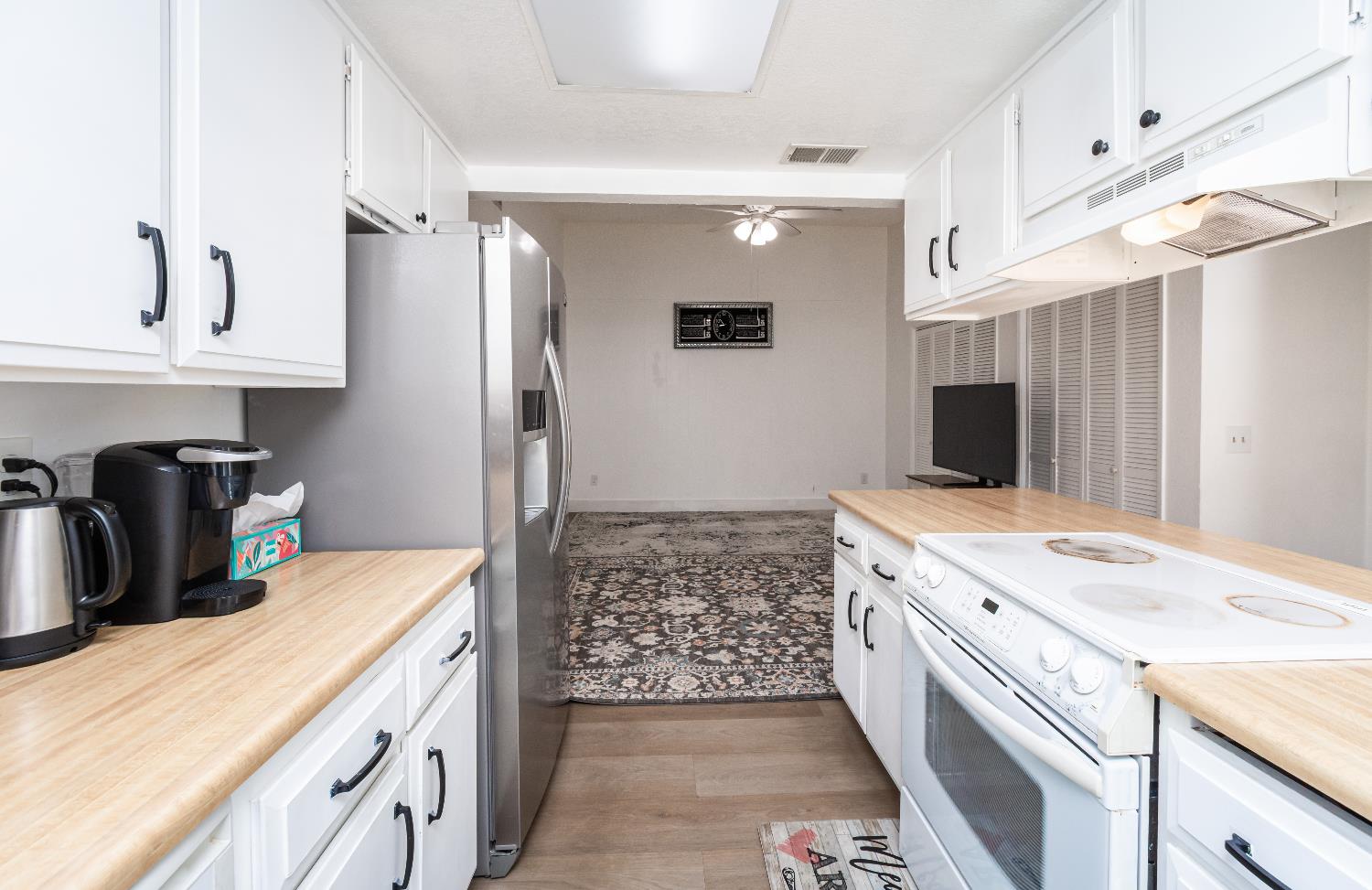 2000 Inglis Way, Unit A Roseville, CA 95678 - Photo 17 of 45 a kitchen with a sink stove and refrigerator