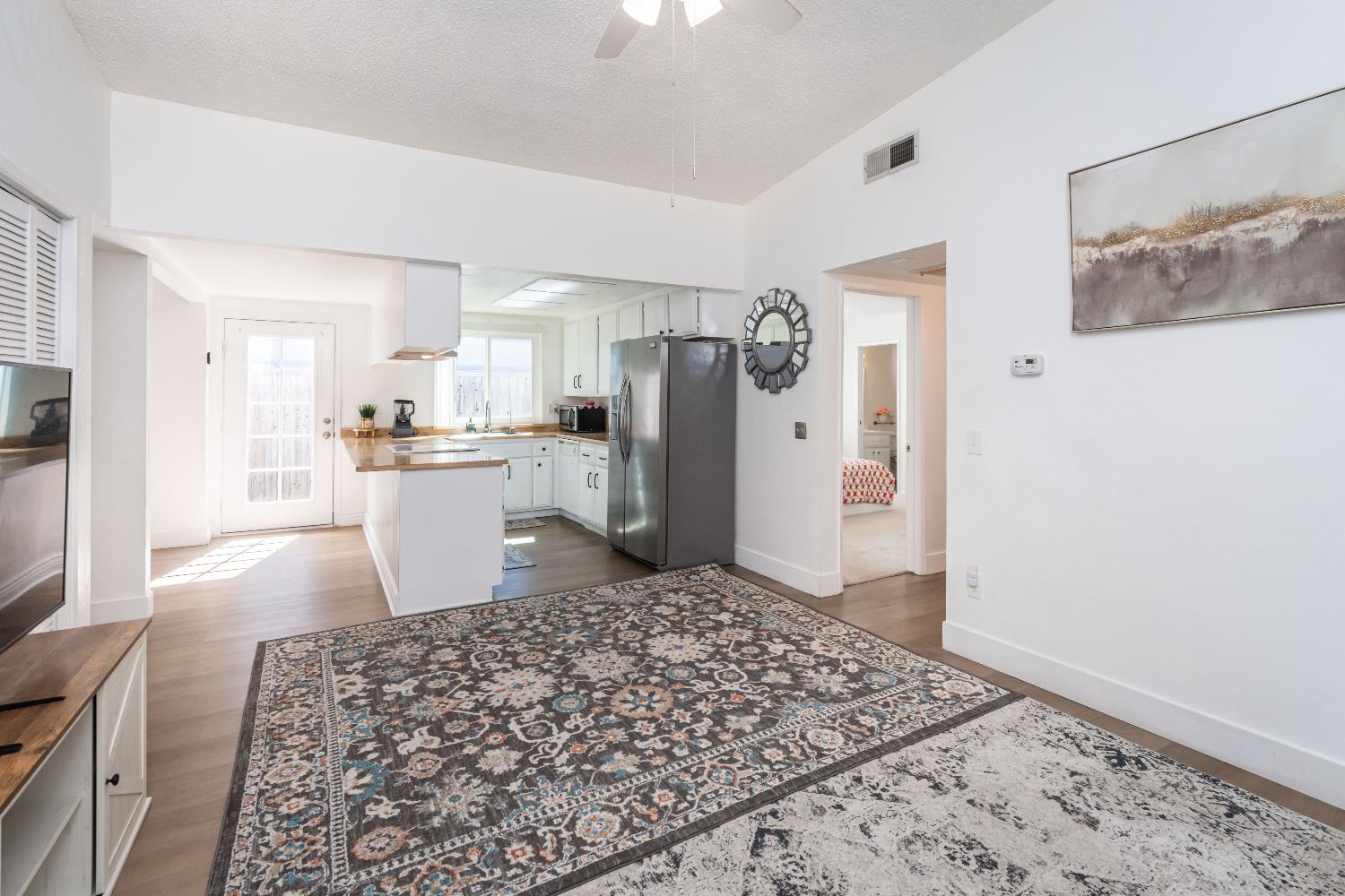 2000 Inglis Way, Unit A Roseville, CA 95678 - Photo 20 of 45 a kitchen with a refrigerator and a stove top oven