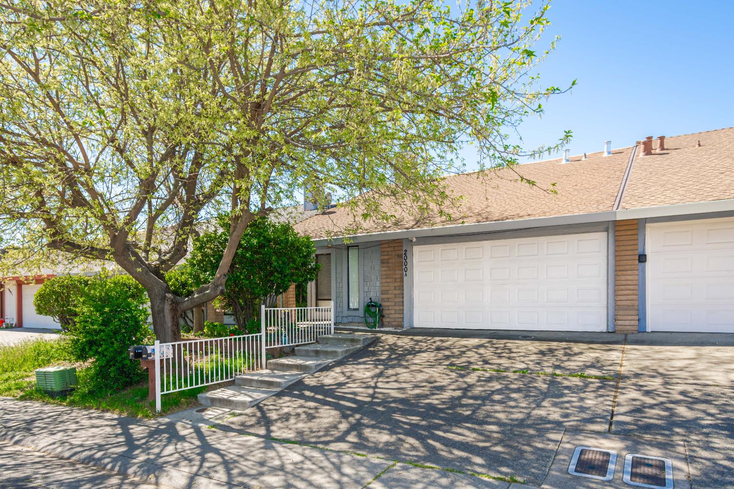 2000 Inglis Way, Unit A Roseville, CA 95678 - Photo 2 of 45 a front view of a house with garage