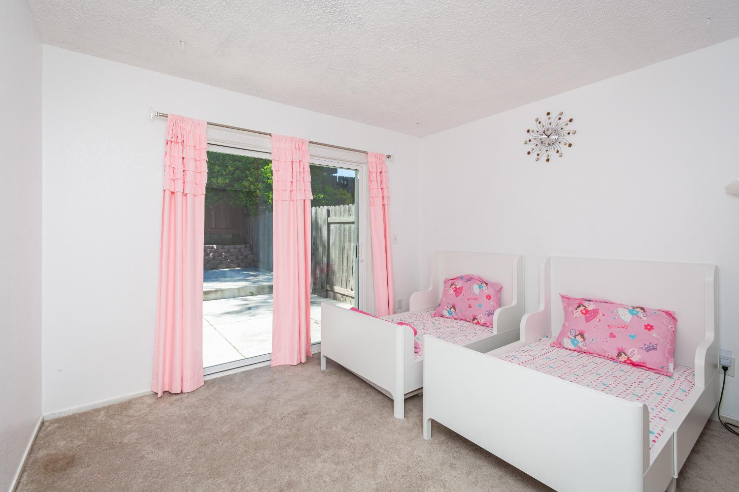 2000 Inglis Way, Unit A Roseville, CA 95678 - Photo 24 of 45 a bedroom with furniture and a window