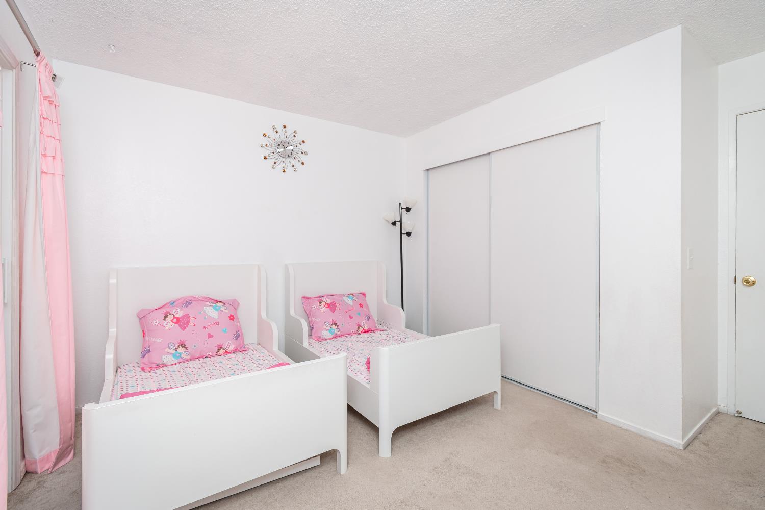 2000 Inglis Way, Unit A Roseville, CA 95678 - Photo 25 of 45 a bedroom with furniture and a bed